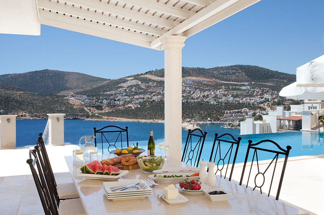 Dining table on terrace of luxury holiday villa, Republic of Turkey