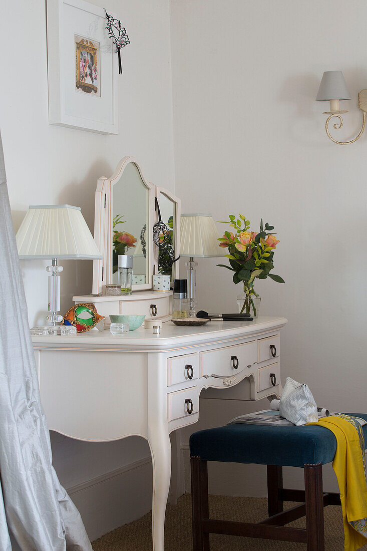 Cut flowers on dressing table in London bedroom,  England,  UK