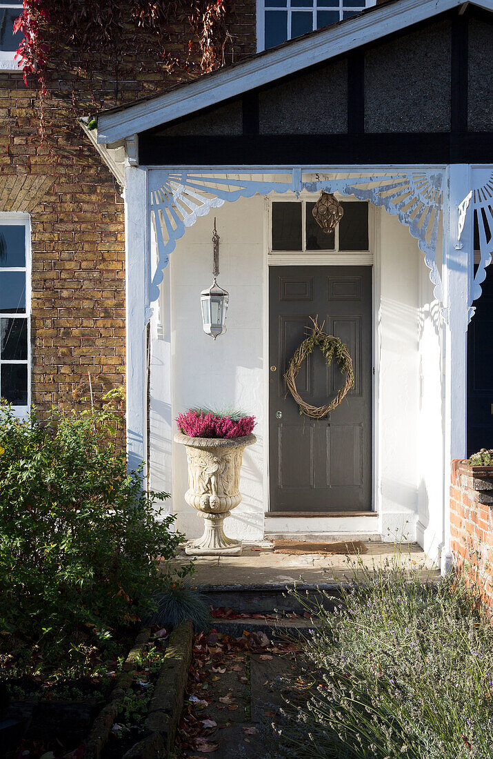 Sunlit porch of semi-detached Berkshire home,  England,  UK