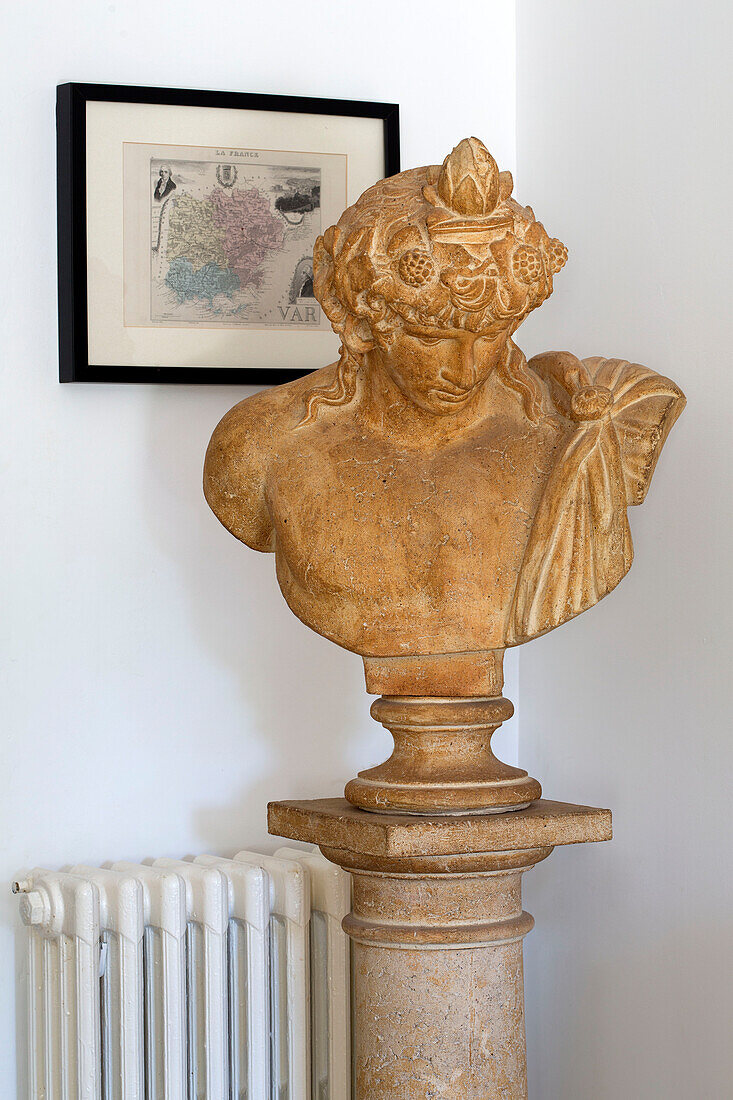 Historic bust on plinth in Var farmhouse Provence France