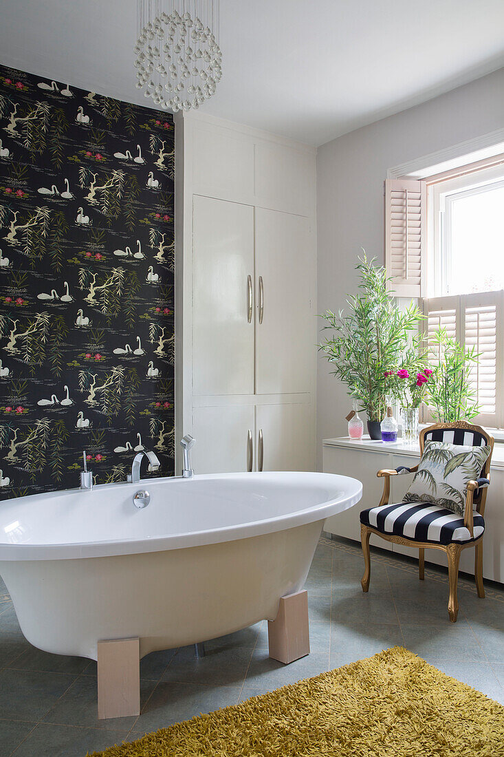 Freestanding bath with black feature wall in Brighouse West Yorkshire UK