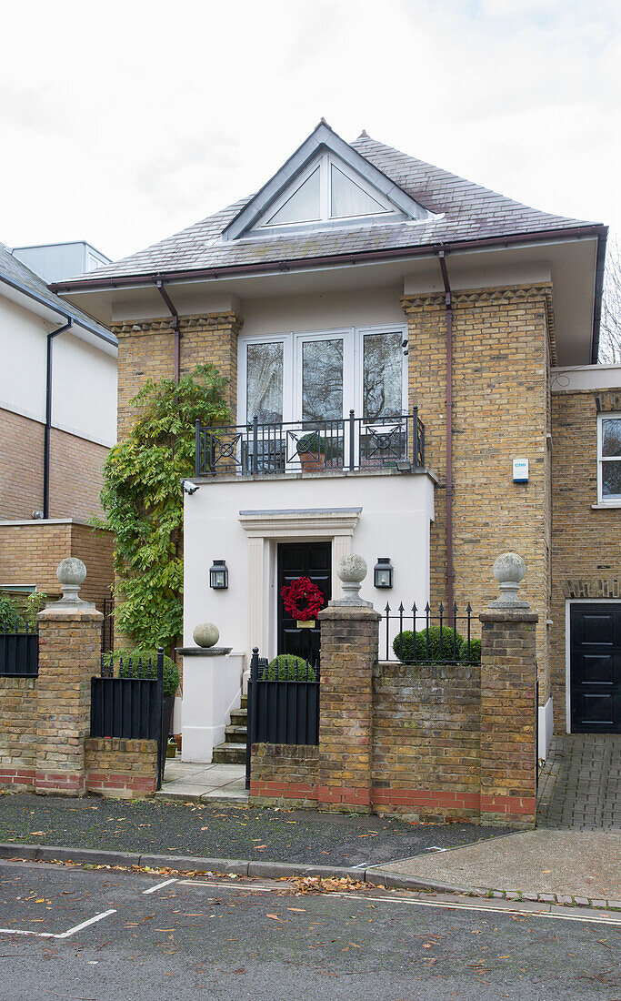 Exterior facade of detached London townhouse England UK