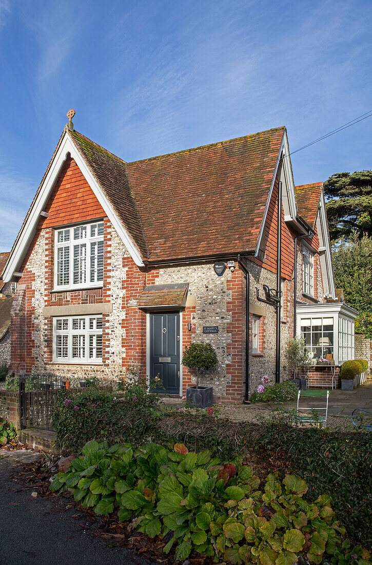 Grey front door of detached West Sussex home