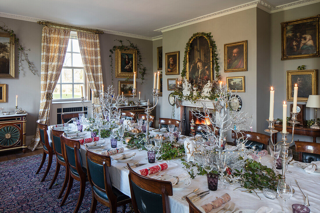 Silverware and ivy on table for Christmas dinner in Georgian home Hertfordshire England UK