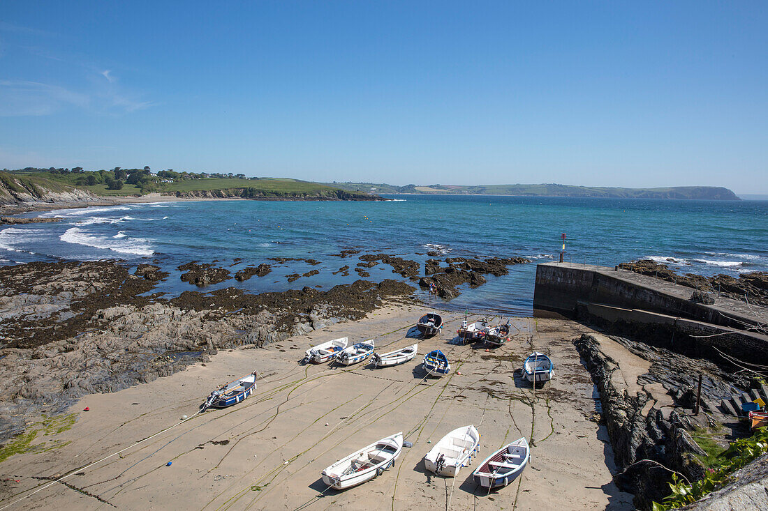 Fishing boats in coastal harbour Cornwall UK