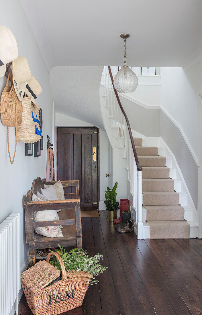 Stained original floorboards in wide hallway of Grade II listed country house Hertfordshire UK