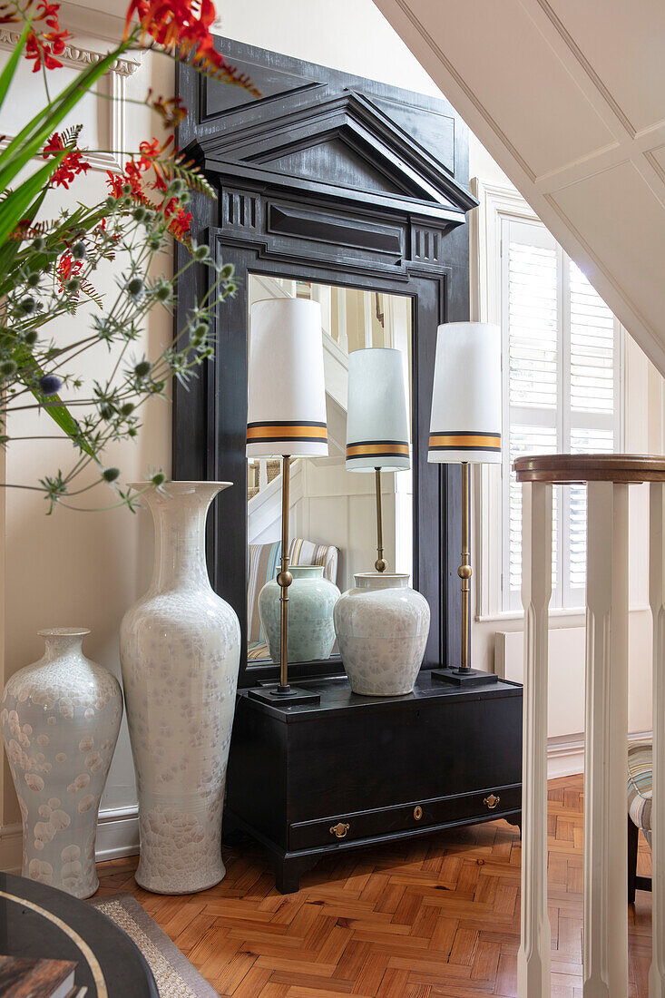 Large vases and lamps in hallway Wales UK