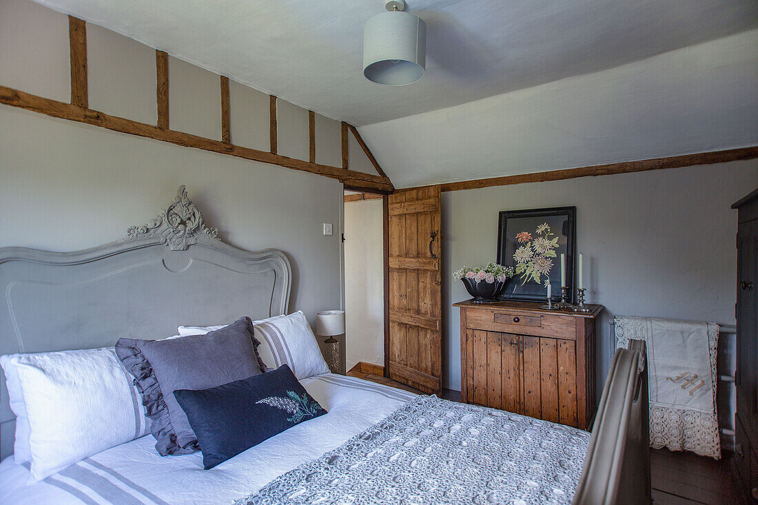 Painted French headboard and homemade cushions