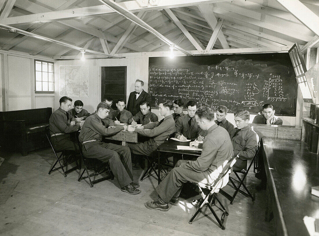 Civilian Conservation Corps studying maths with WPA teacher