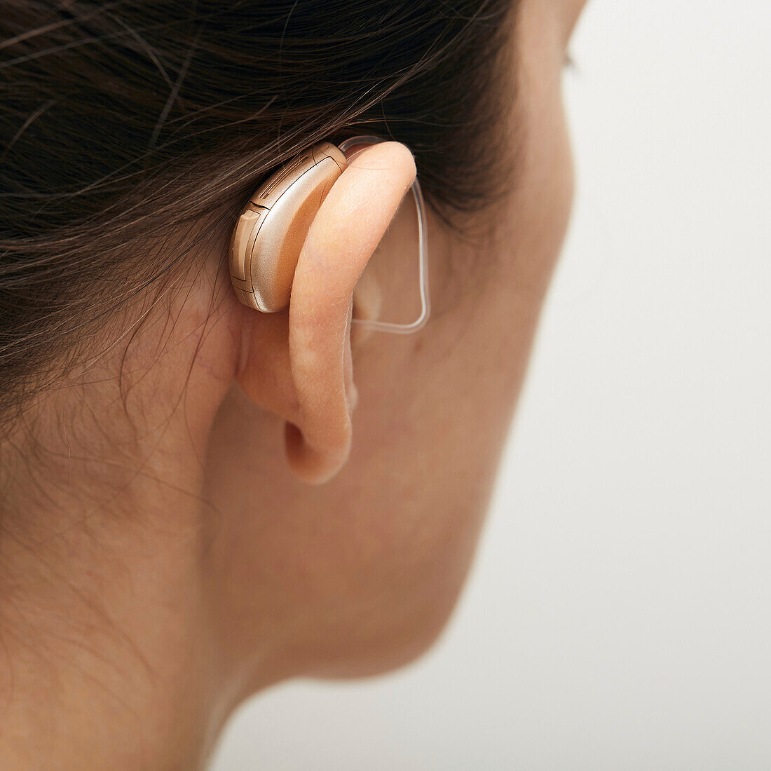 Woman wearing hearing aid