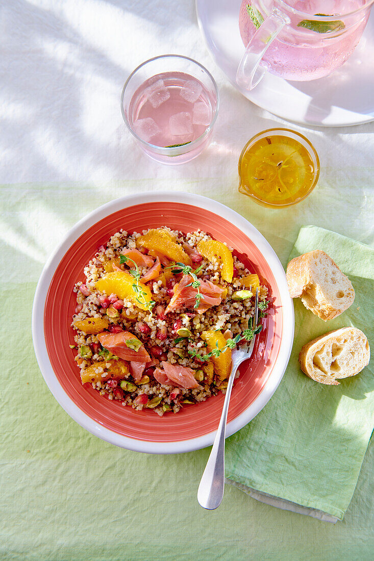 Quinoa salad with salmon and orange fillets