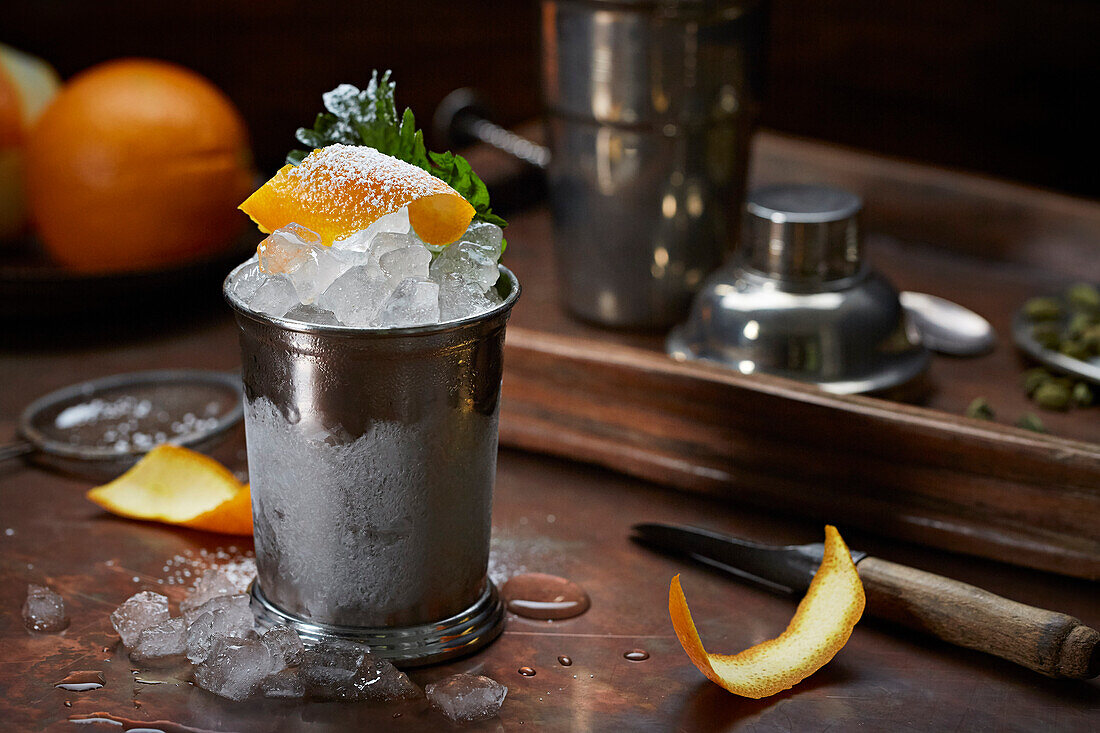 Frozen cocktail garnished with orange peel