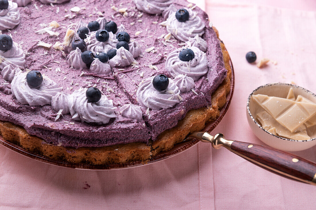 Vegan cake with nut base and blueberry cream