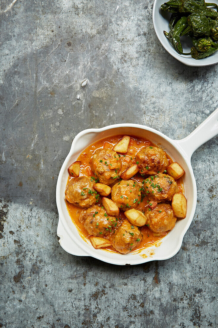 Meatballs cooked in a tomato sauce