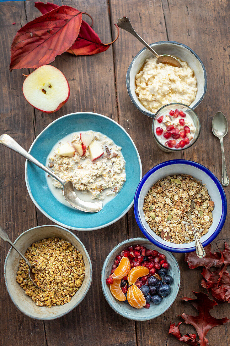 Healthy breakfast with porridge, granola and fruit