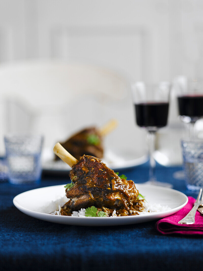 Slow-braised lamb shanks with coconut and cardamom
