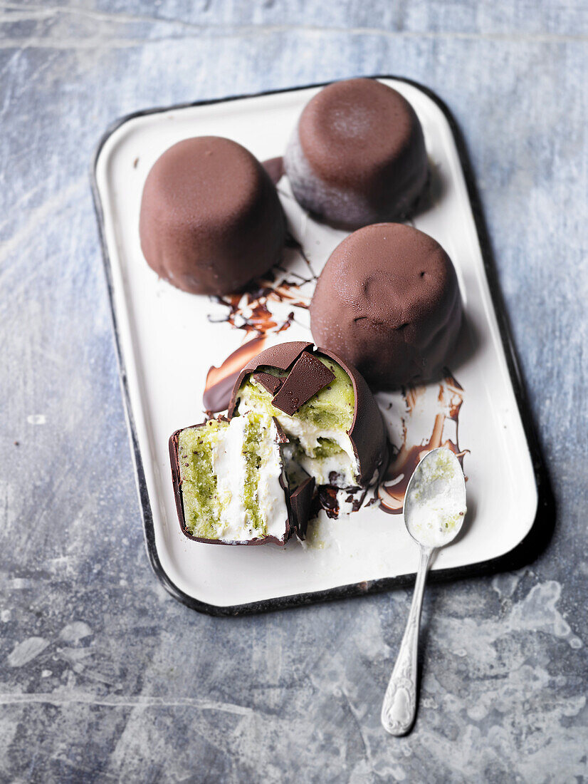 Kiwi ice cream bombs with chocolate icing