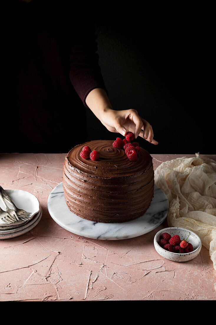 Schokoladenmousse-Torte mit Himbeeren – Bilder kaufen – 13595507 StockFood