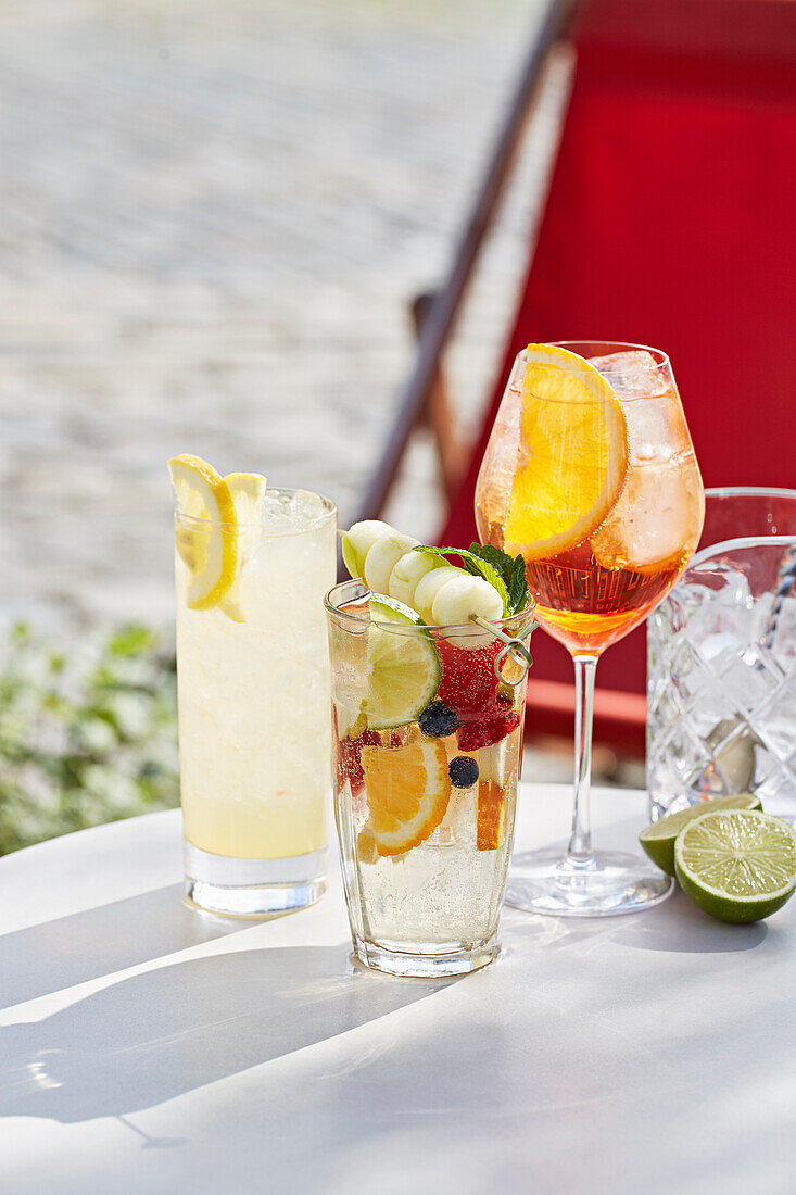 A selection of summer drinks on a table outdoors