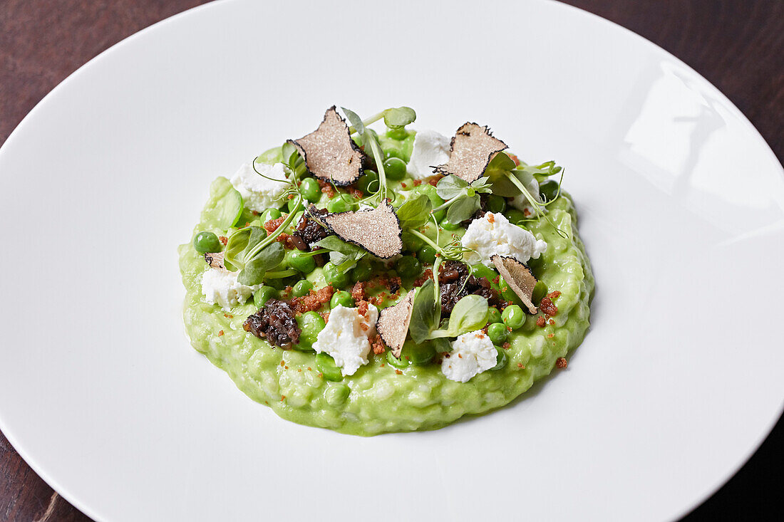 Pea risotto with truffle shavings