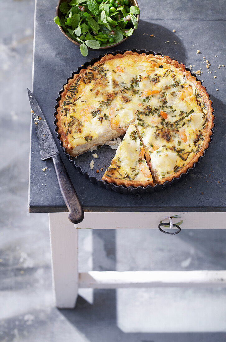 Fish pie tart with minted pea salad