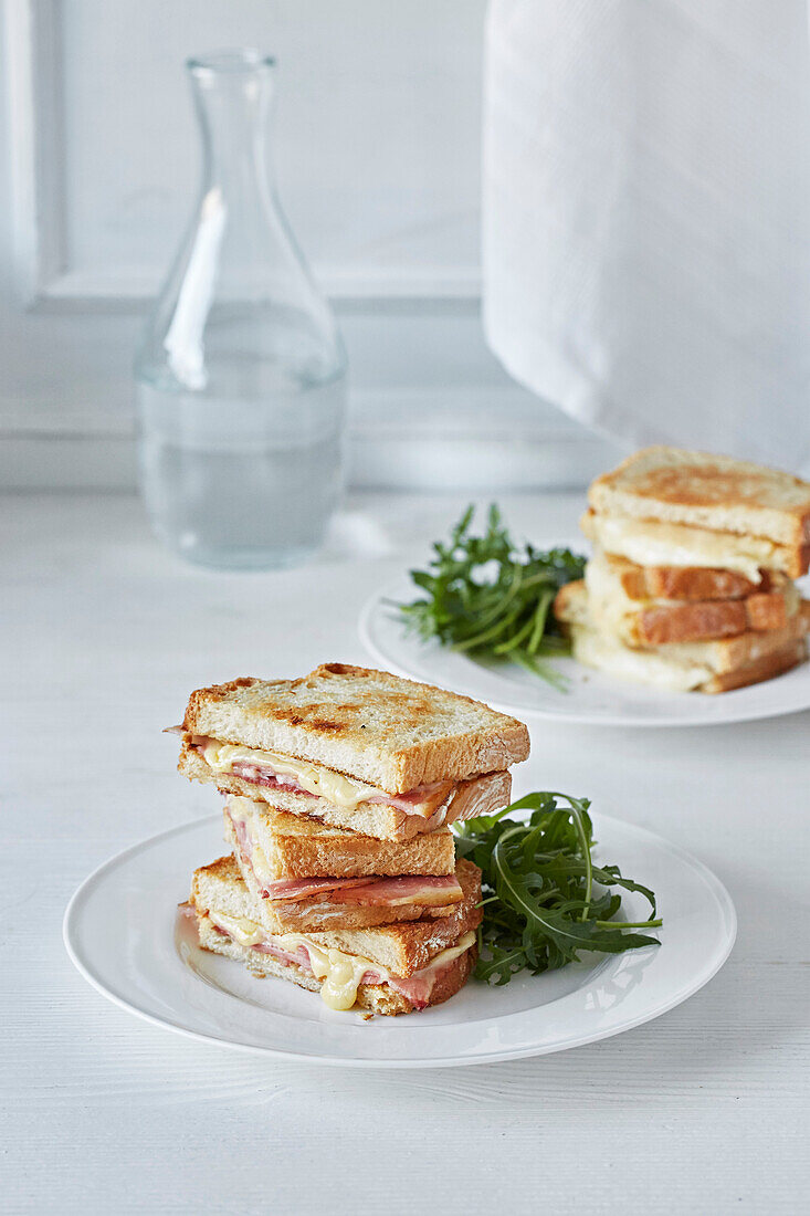 Ham and cheese sandwich with rocket salad