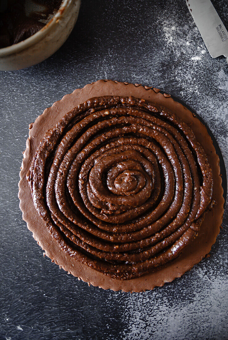Chocolate Galette des Rois (Epiphany cake, France) prepared with chocolate-hazelnut cream