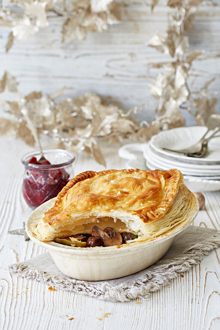 Mushroom pie with a puff pastry topping for Christmas