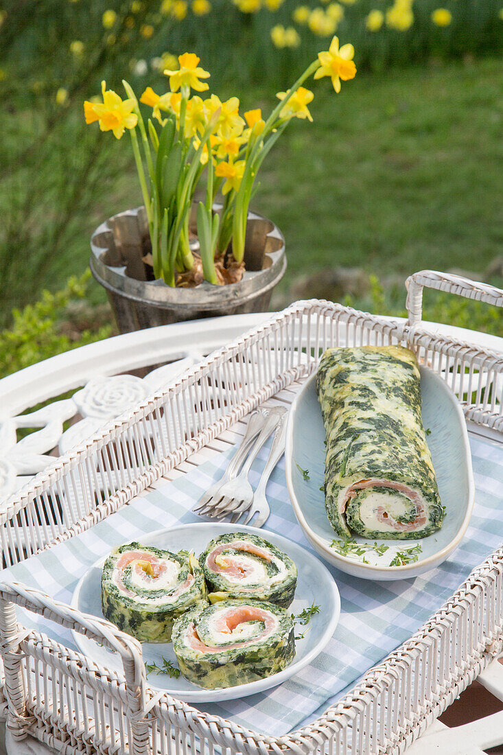 Spinach omelette roll with salmon and cream cheese