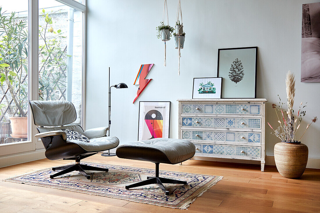 Vintage lounge chair and chest of drawers in the living room