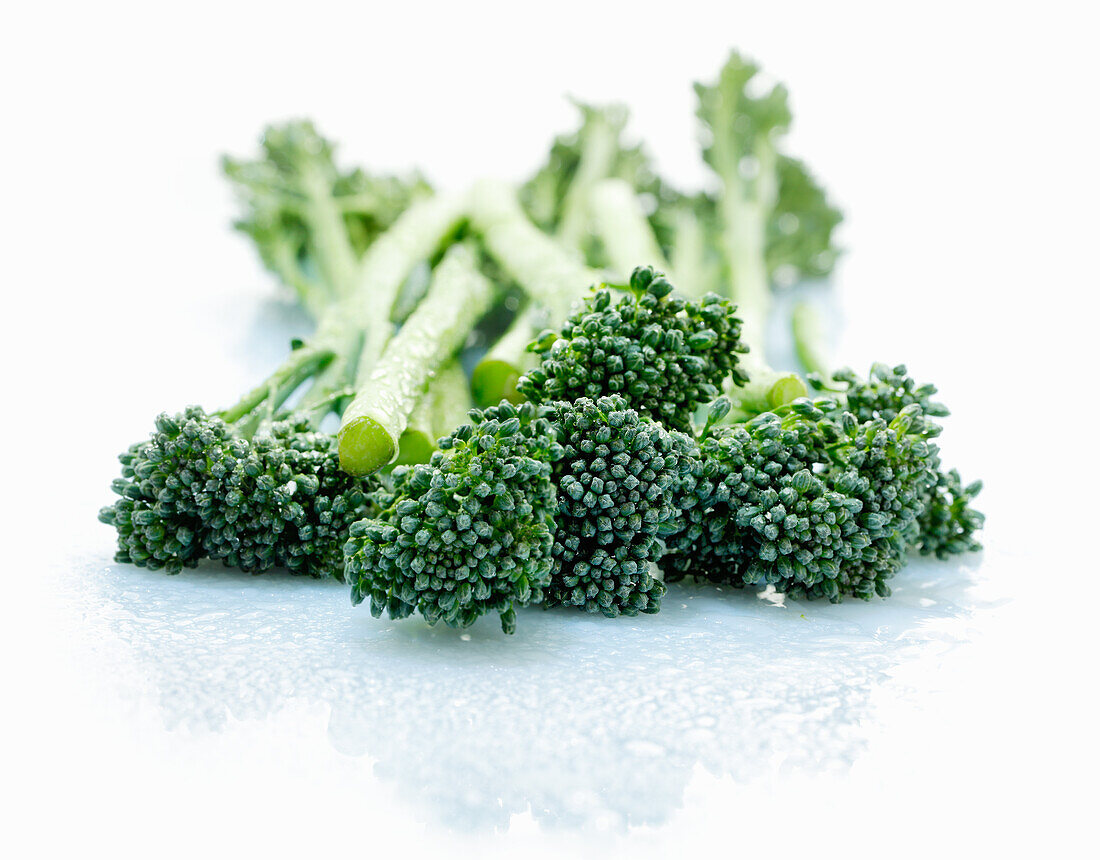 Broccolini on a white background