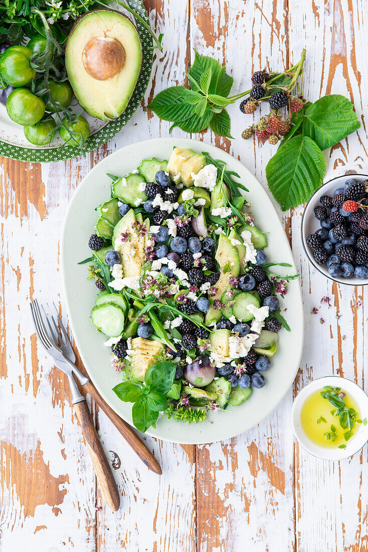 Avocado berry salad with cucumber and feta