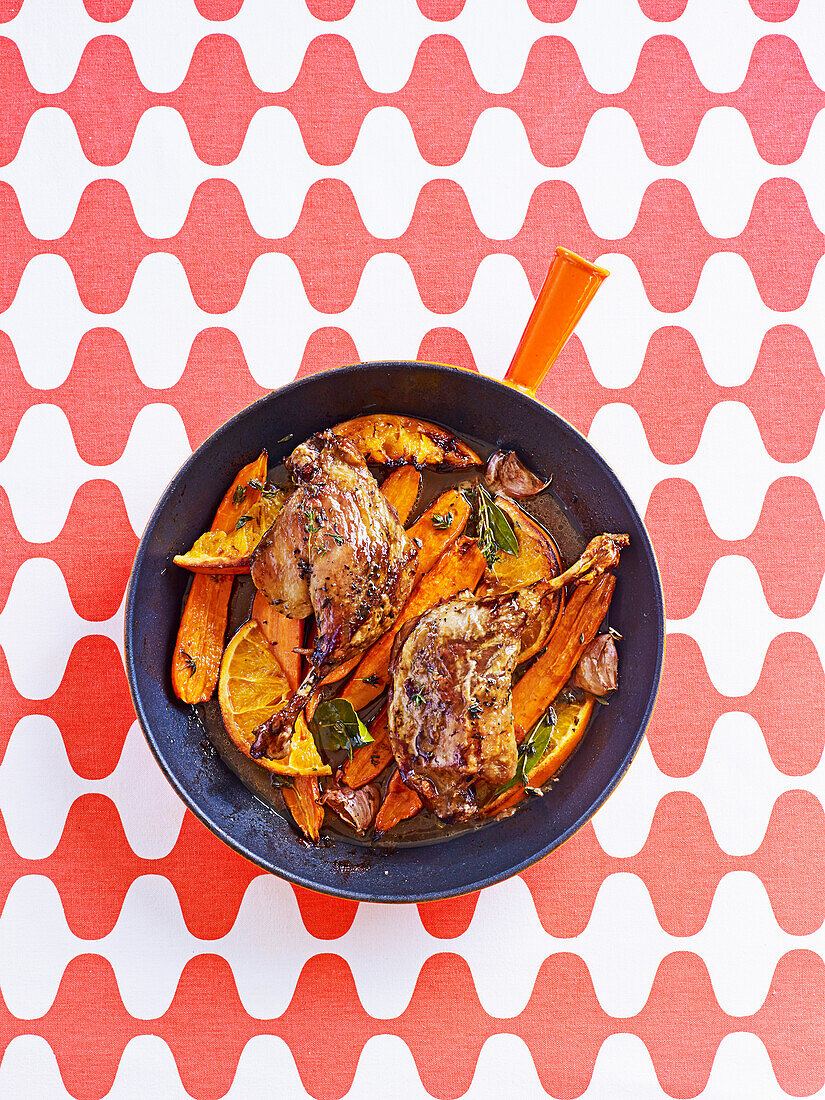 Tender roast duck with citrus and carrots