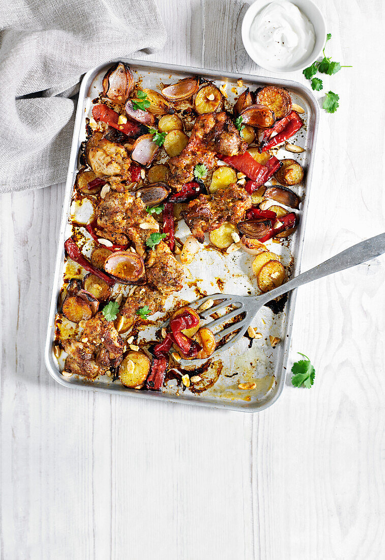 Chicken, red pepper and almond traybake