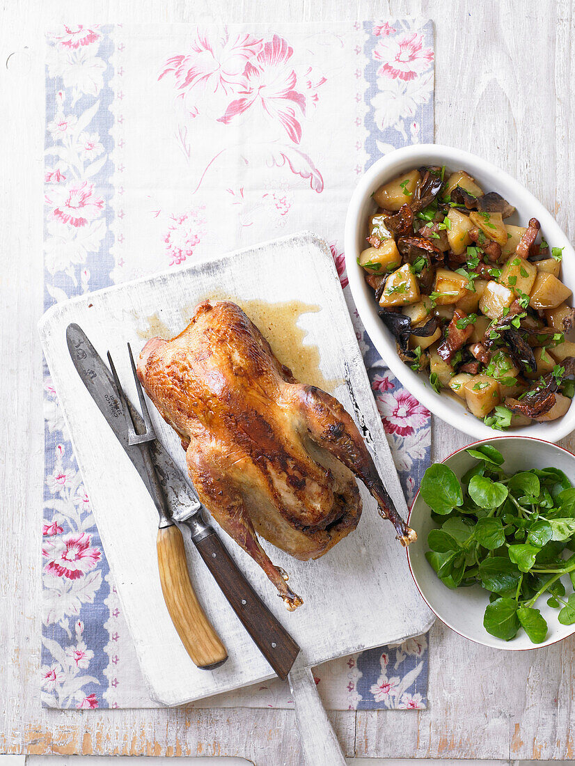 Roast pheasant with wild mushroom, potato and bacon ragout