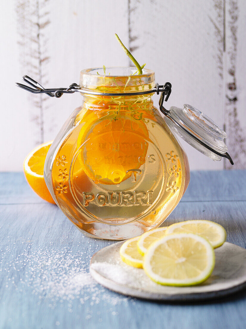 Homemade elderflower syrup with orange and lemon