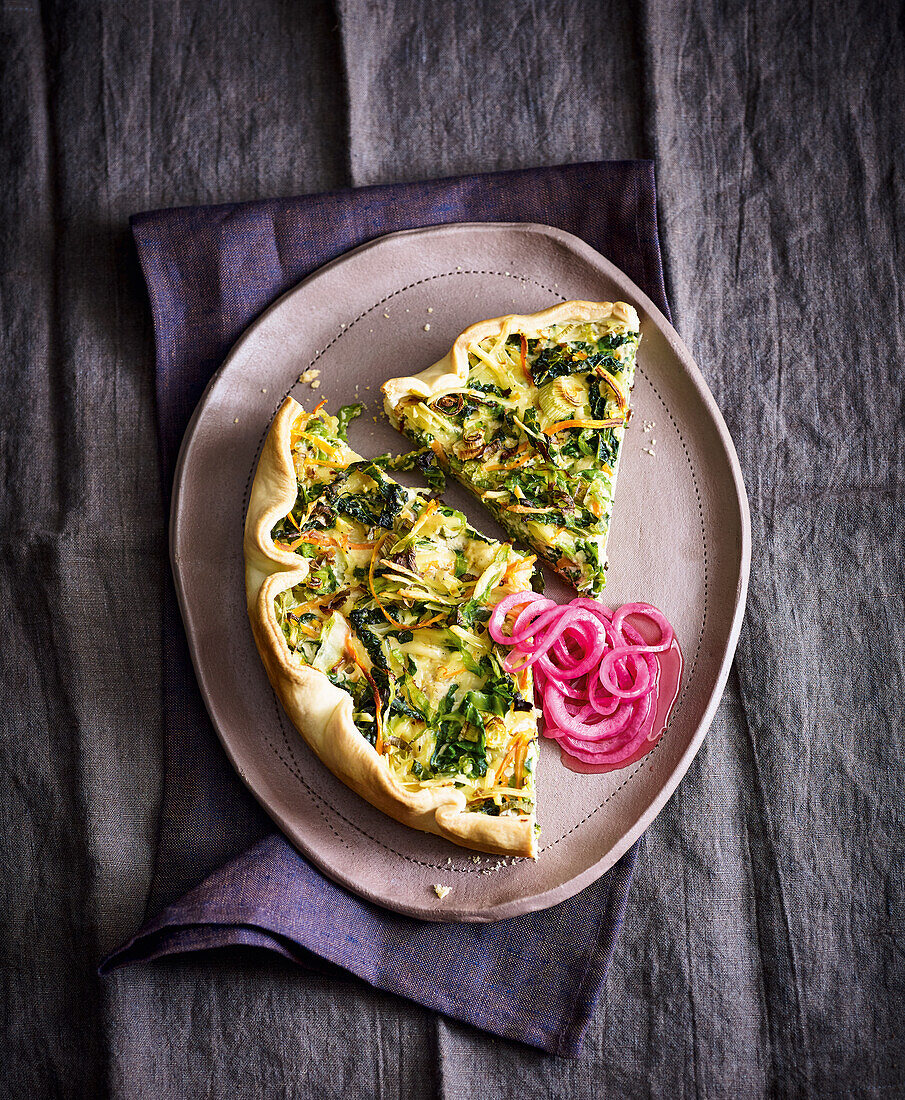 White cabbage quiche with colorful leftover vegetables