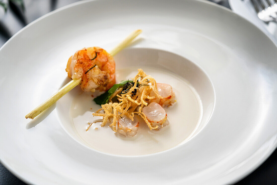 White coconut soup with prawns