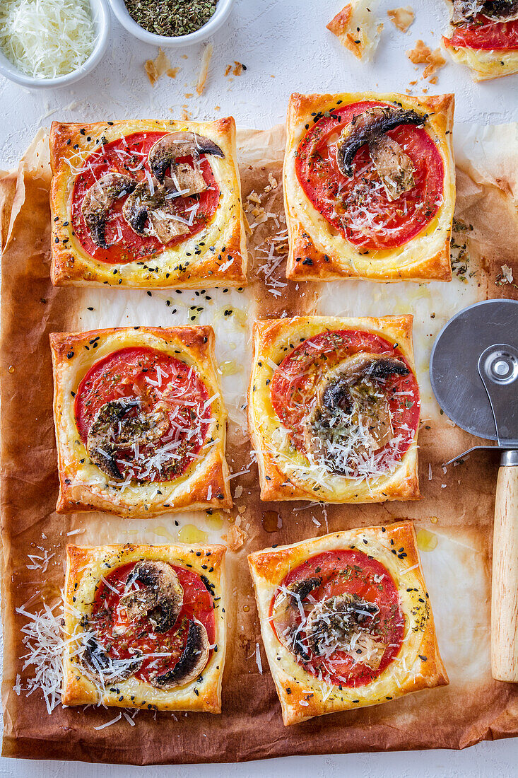 Snack made of puff pastry and tomatoes