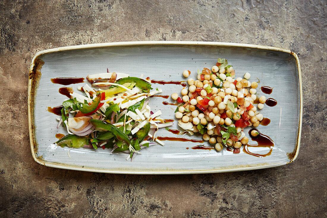 Mixed vegetable salad and a large bulgur wheat salad