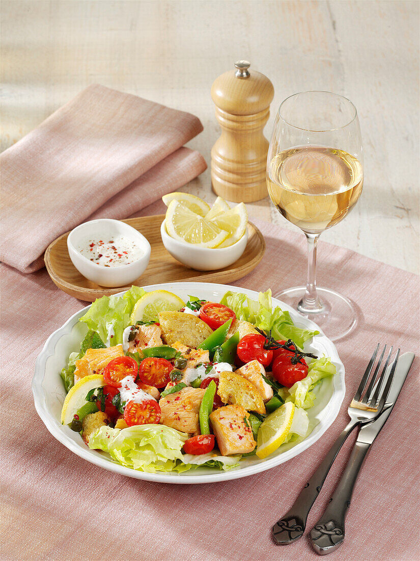 Oven-baked bread salad with salmon