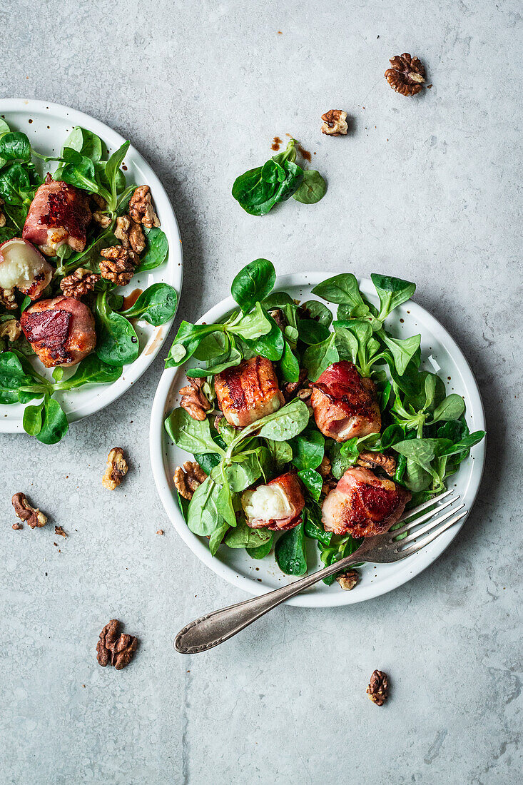 Lamb's lettuce with goat's cheese wrapped in bacon and walnuts