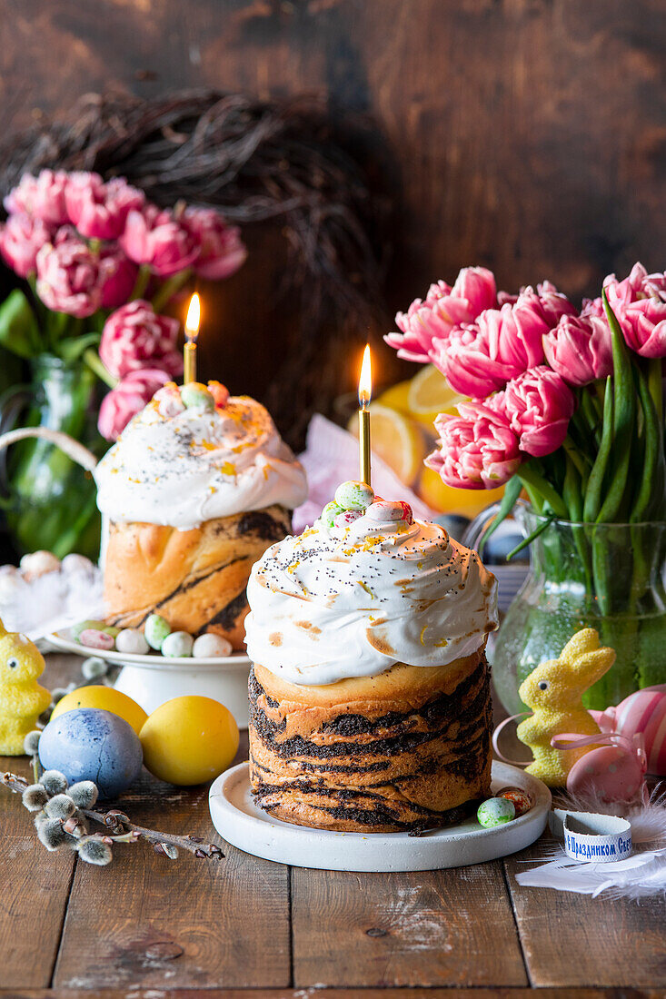 Traditional Easter cake kulich with poppy seed and meringue topping