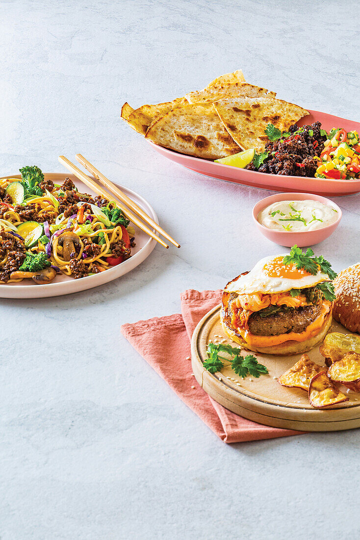 Spicy fried mince with tortillas, Egg noodle stir, Korean-style kimchi burgers