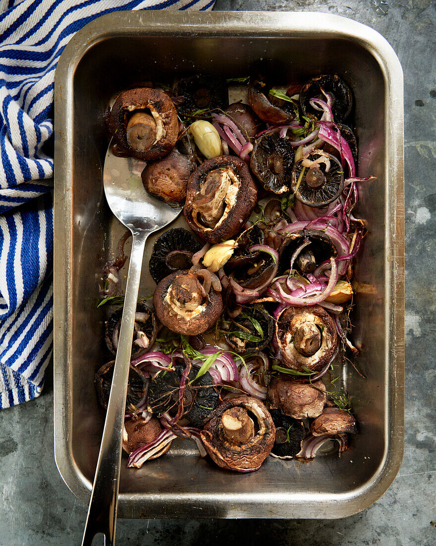 Fried mushrooms with red onions and herbs