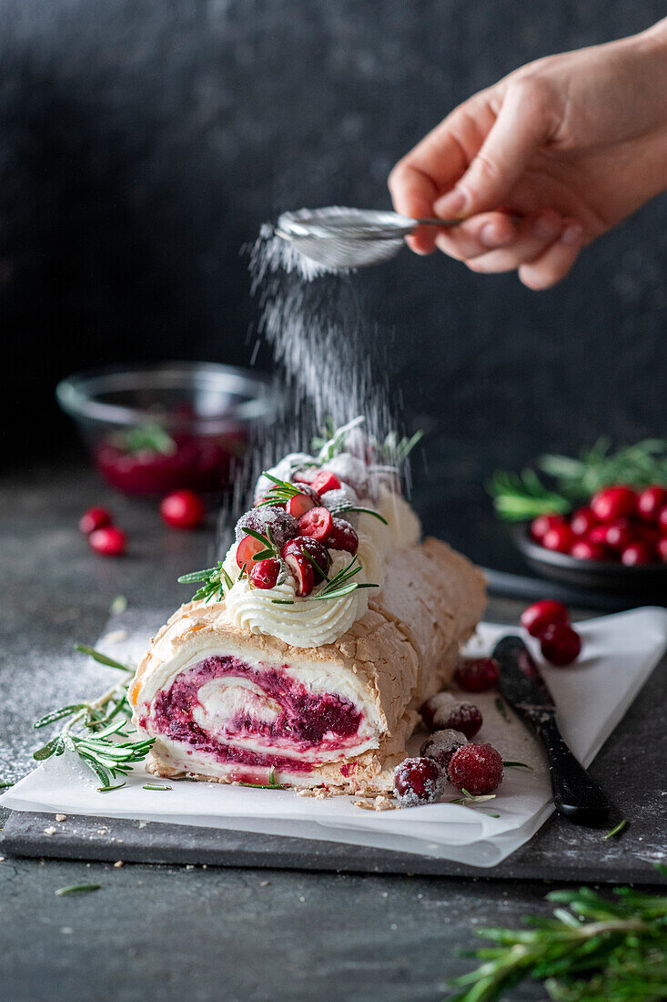 Meringue roll with cranberries