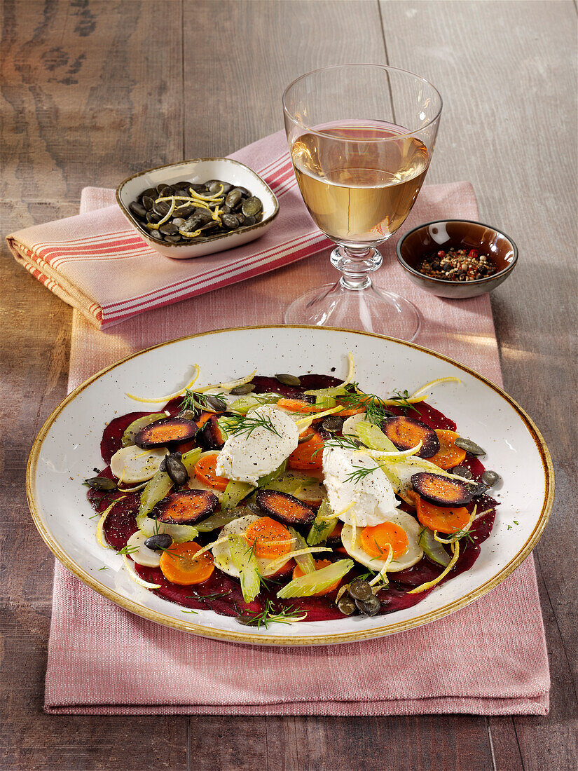 Oven vegetable carpaccio with horseradish cream cheese and pumpkin seeds