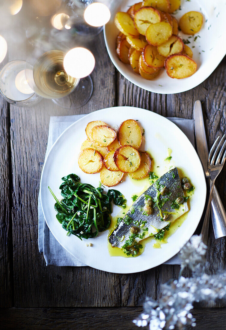 Baked sea bass with lemon caper dressing