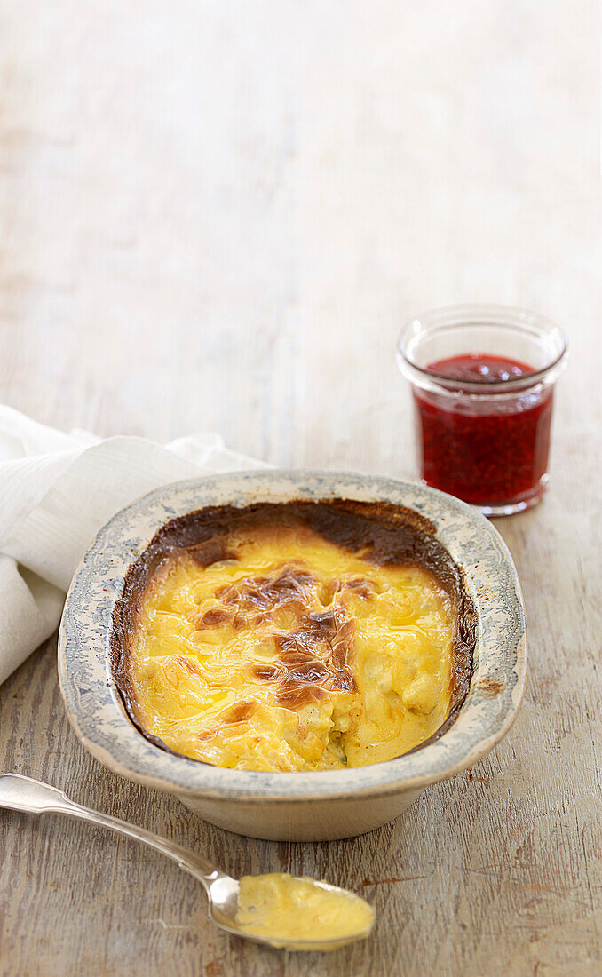 Slow baked clotted cream with quick raspberry jam