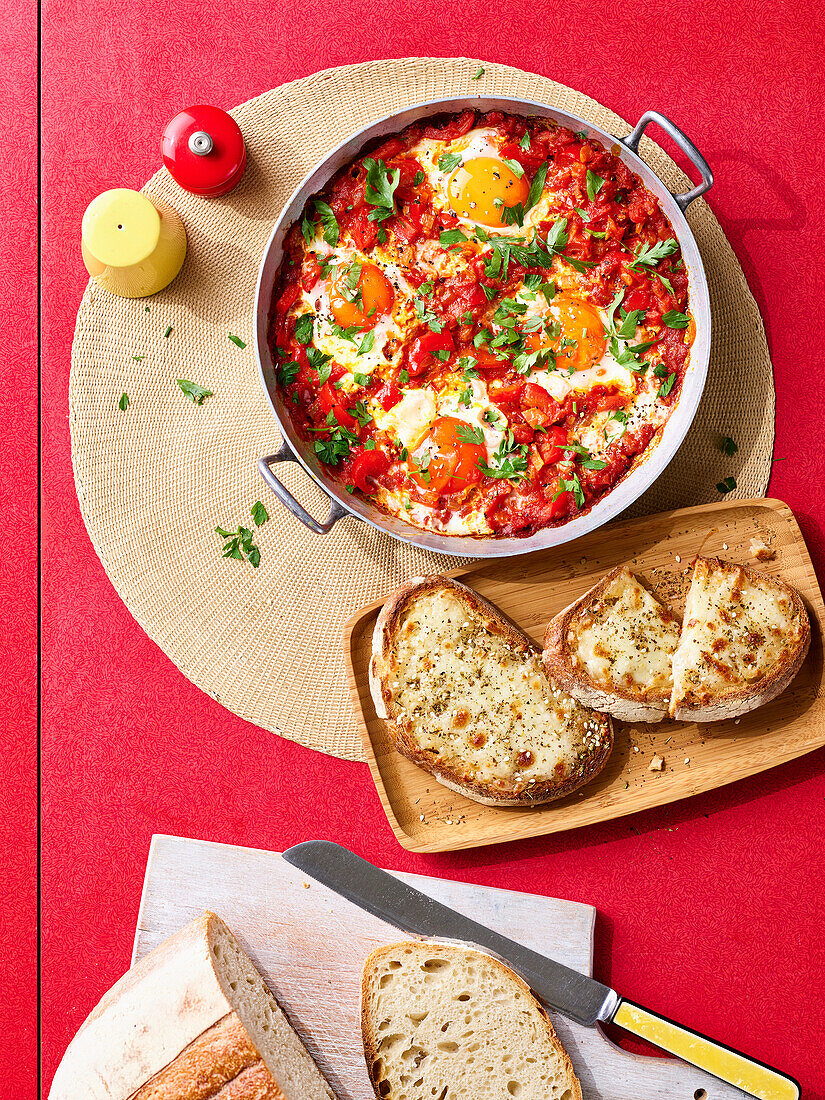 Shakshuka - Baked eggs in a tomato sauce with crusty bread